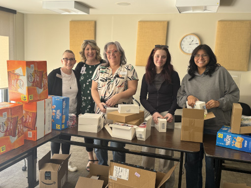 SANEWA volunteers gathering supplies for May Day baskets for local seniors