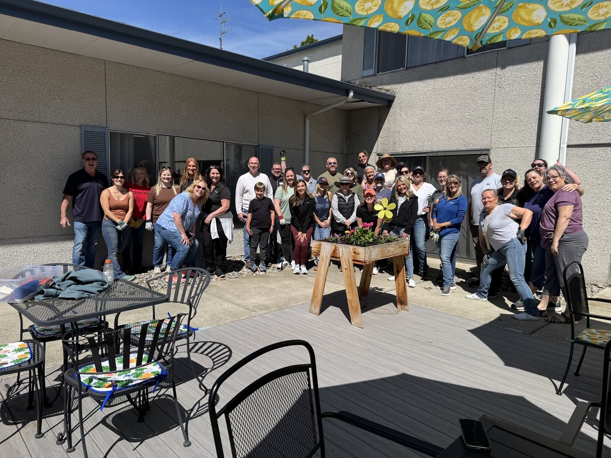 SANEWA volunteers gathered after refreshing the patio at Wedgewood Senior Living